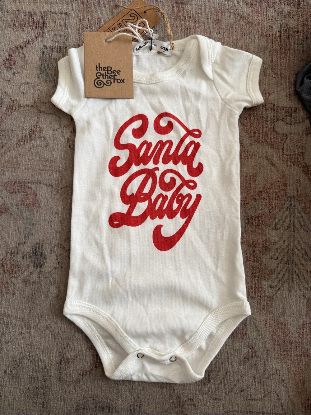 the Bee & The Fox White 'Santa Baby' Infant One-Piece Bodysuit with Red Script